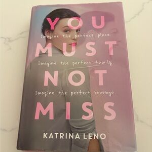 YOU MUST NOT MISS 
KATRINA LENO 
Hardcover Book